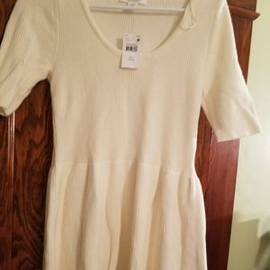 Ivory maternity peplum sweater